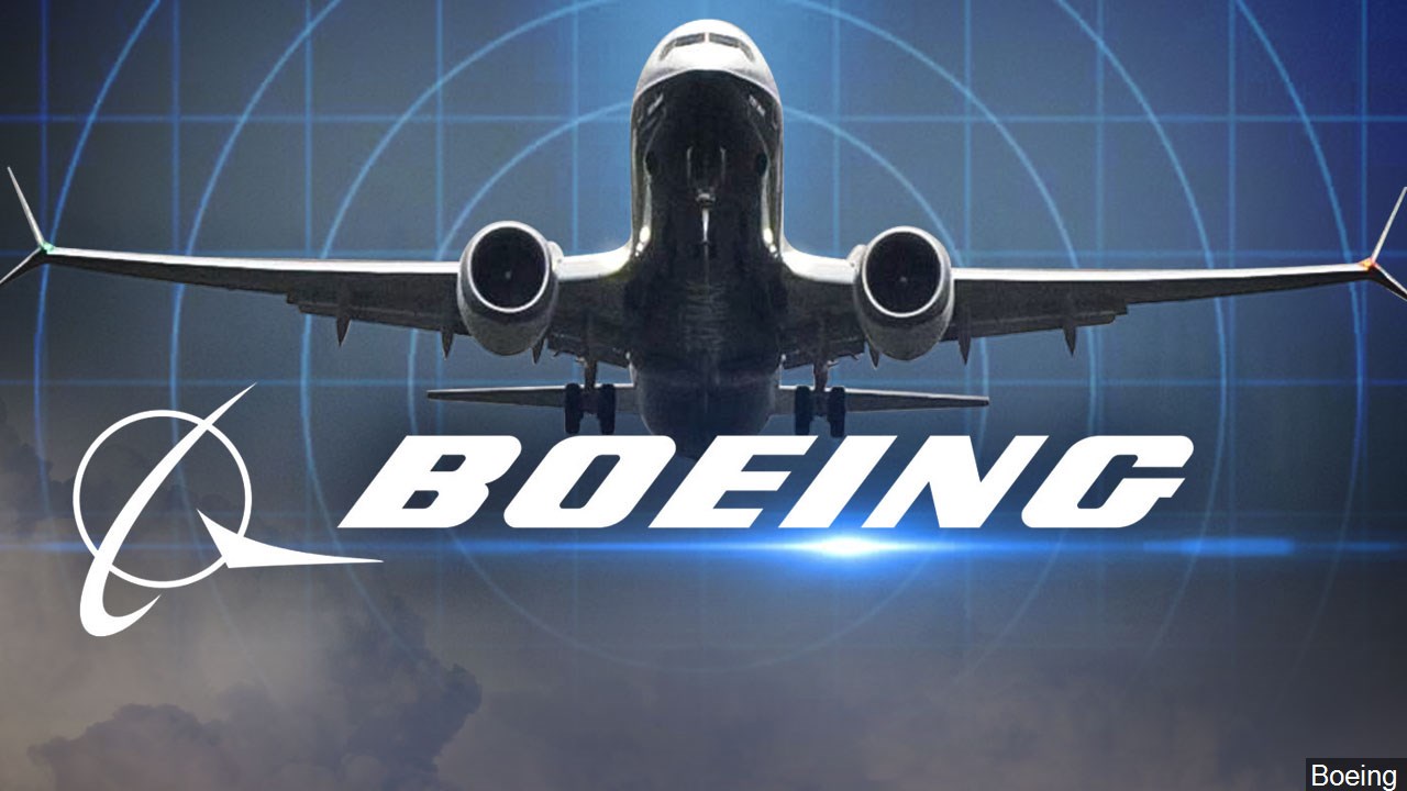 Boeing posts largest-ever quarterly loss; warns of cuts in 737 output